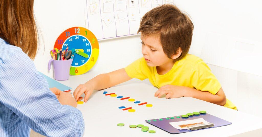 A child is engaged in a play therapy session while under the supervision of an ABA provider.